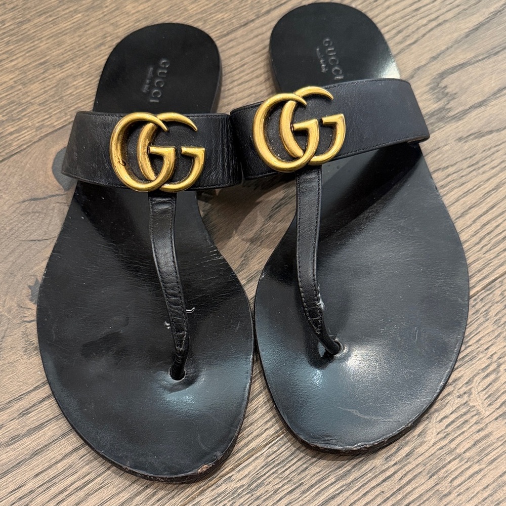 Gucci Black Leather Sandals with Gold Emblem